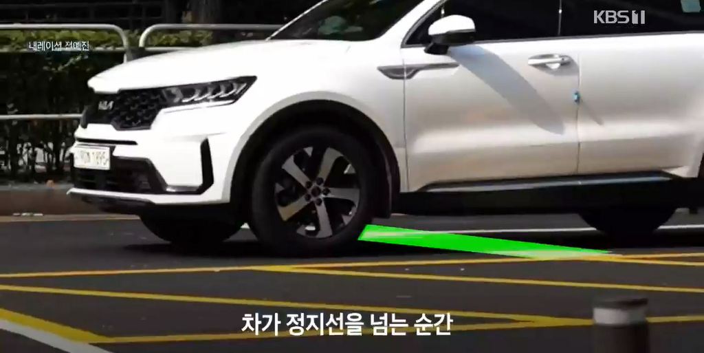 정지선-위반을-무려-80%나-줄여준-전광판.jpg-0-이미지